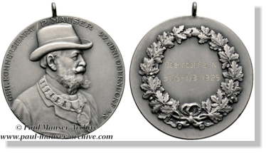 1929 shooting medal that commemorates the Mauser medal for the Mausers 70th birthday. All Rights Reserved.